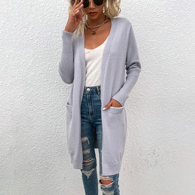 China Anti-wrinkle 2021 autumn and winter solid color mid length pocket knit plus size women's sweaters cardigan jacket for sale