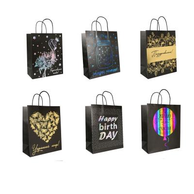 China Recyclable Gold Color Hot Stamping Foil Printed Logo Luxury Gift Paper Bags for sale