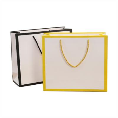 China Recycled Materials Thickened White Card Paper Bag Glass Clothing Gift Paper Bag Handheld Customized Logo for sale