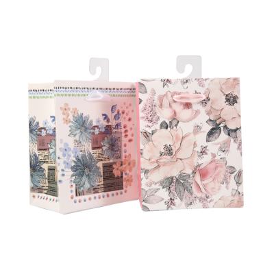 China 2021 Flower Plant Design Gift Recyclable Luxury Paper Shopping Bag for sale