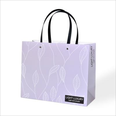 China New Recyclable Custom Gift Paper Bag Single Leaf Hand Held Bag for sale