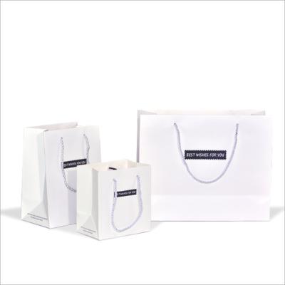 China Recyclable Birthday Gift Bag New Square Gift Bag Simple Clothing Handheld Baking Paper Bag for sale