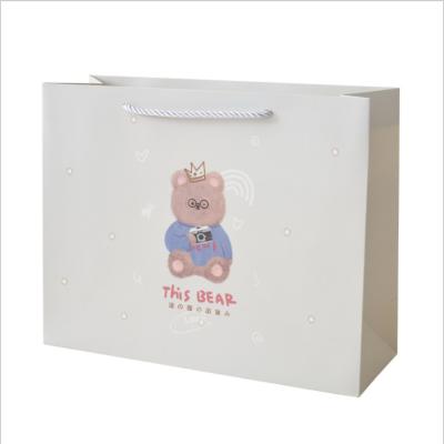 China Custom Cute Bear Recyclable Tote Handle Paper Bag Wrapping LOGO Packing Cartoon Teddy New for Children's Day Children's Apparel Gift Wrapping for sale