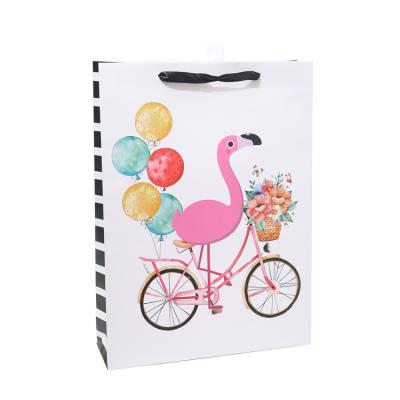 China Cartoon Recyclable Flamingo Animal Printing Custom Gift Bag For Children Children's Day Baby Gift Paper Bag With Ribbon Handle for sale