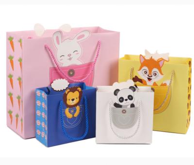 China 2022 Custom Recyclable Logo Cartoon Children's Day Birthday Gift Bag Baby Gift Paper Bag One Month Gift Bag for sale