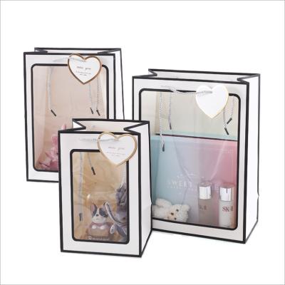 China Recyclable Manufacturers Wholesale Valentine's Day Gift Bag Transparent Window INS Gift Bag Can Be Customized for sale