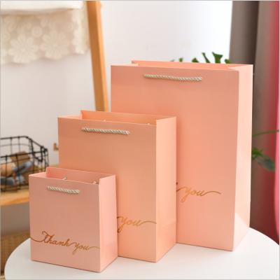 China Recyclable Golden Paper Bag For Valentine's Day Ornament Wrapping Elegant Exquisite Gift Bag Gift Paper Bag for sale