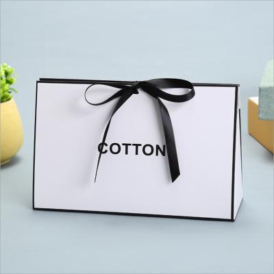 China New Recyclable Bowknot Gift Bag Fashion Jewelry Bag For Valentine's Day Exquisite Eco-friendly Paper Bag for sale