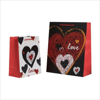 China Recyclable Valentine's Day Gift Bag Powder Paper Bag Love Gift Bag High End Eco-friendly Custom for sale