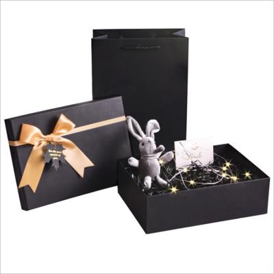 China High End Bowknot Black Paper Box Large Materials Recycled Cosmetics Gift Box Custom for sale