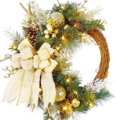 China Natural Artificial Christmas Door Ring Christmas Wreath For Home Hanging Light PVC/PE Rattan Decor for sale