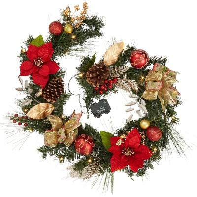 China Christmas Decorations 2022 Luxury Gold Leaves Artificial Pinecone Berry Ball Decorative Christmas Garland With Bow for sale