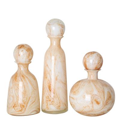 China Interior Home Decorations Stocked Patches Art Craft Glass Ornament Quicksand Bottle Vase For Table for sale