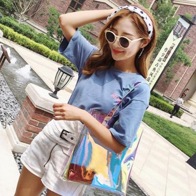 China Hot-selling reusable fashion pvc laser tote bag trendy fashion out of the street accessories laser lady shopping bag for sale