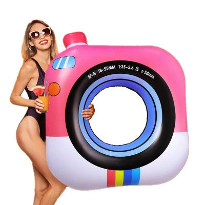 China Outdoor Entertainment Summer beach camera inflatable swimming ring float for adults and kids for sale