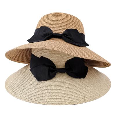 China Eco-Friendly Summer Spring Outside Picnic Big Brim Sunscreen Womens Bowler Straw Hat With Ribbon for sale