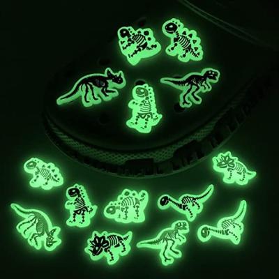 China Soft Luminous Dinosaur Shoe Charms Decoration PVC Pins Decoration For Croc Shoes Bracelets Dinosaur Themed Gift for sale