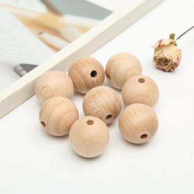 China DIY 20mm Polished Natural Beech Wood Chewable Loose Beads For Baby Teething for sale