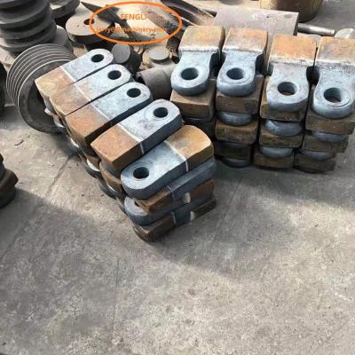 China Factory High Manganese Steel Casting Spare Parts The Hammer Head Of Hammer Crusher for sale