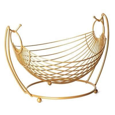 China China OEM/ODM Serving Metal Swing Fruit Basket Vegetables Display Stand Rack Iron Wire Cavity Storage Desktop Basket with Lowest Price for sale