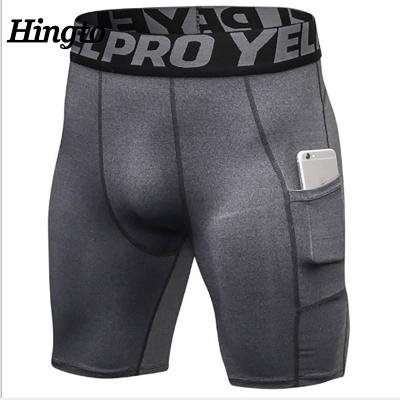 China Best Selling Men's Sportswear QUICK DRY Running Training Compression Shorts Male Yoga Sports Shorts for sale