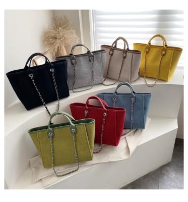 China Simple 2022 Fashion Canvas Bag Women Fashion Tote Chain Bag Korean Shopping Bag for sale