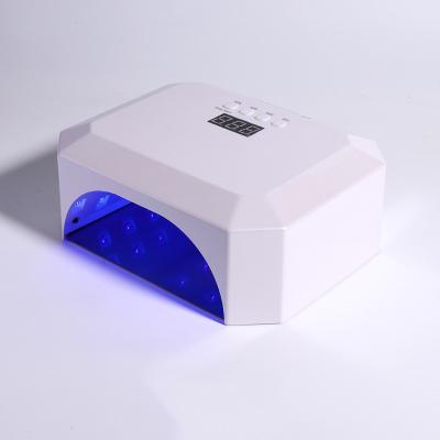 China Top Multifunctional Nail UV Dryer LED Lamp Wholesale 54W Gel Polish Nail Dryer Machine Led Lamp UV Lamp For Manicure for sale