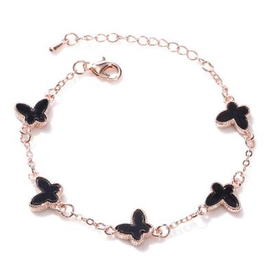 China Vintage Butterfly Charm Bracelet Fashion Good Luck Four Leaf Clover Bracelets For Women for sale