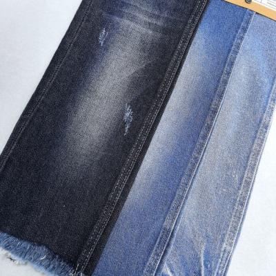 China Sof Hand Feeling Cotton Spandex Denim Fabric Low Elastic Roll Dyed For Lady Or Kids Jean for sale