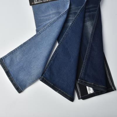 China Tejido 8 oz de algodón poliéster espandéx denim estiramiento denim material azul oscuro en venta