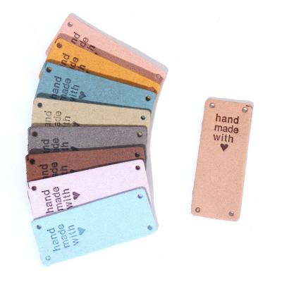 China Washable Apparel PU Labels DIY Colorful Handmade Leather Labels For Hat Bag for sale