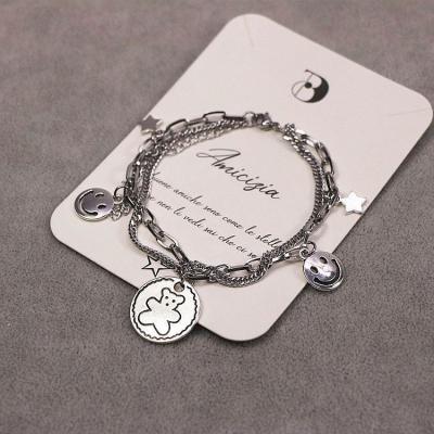 China BOHEMIA fashion multi divan titanium chain bracelet elephant smile face charms steel bracelets pour men and women for sale