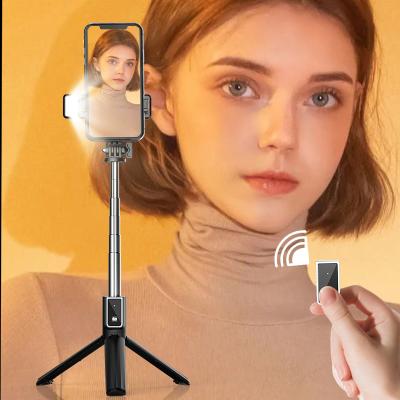 China Folding Mini Portable 6 in 1 Selfie-Stick 360 Degree, Foldable Blue-tooth Wireless Selfie Stick with Silicone Tripod Sufficiency Non-slip Light P40s for sale