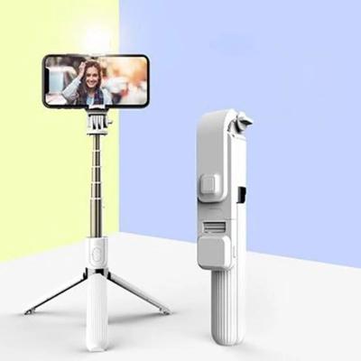 China 360 Degree Sufficiency Light Folding Handheld Telescopic Selfie Stick Mini Portable Flexible Mini Stick Wireless Tripod For Phone L03s for sale