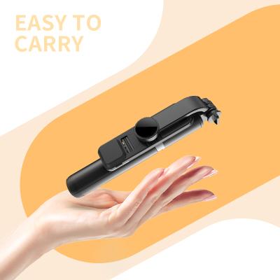 China Wireless Remote Folding Tripod Lighting Selfie Stick Mini Flexible Foldable Mobile Phone Vlog Mini Portable Sample Free for sale