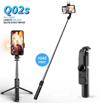 China Mini Portable Fill Light New 1045mm Q02s LED Folding Tripod Wireless Mini Selfie Stick With Light Palos 360 Degree Rotation Selfie for sale