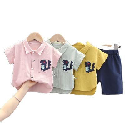 China Little Boy Clothing Set Casual Pocket Pocket Dinosaur Printing Clothing Short Girl Summer Shorts Sleeve Wholesale 2 Piece Sets for sale