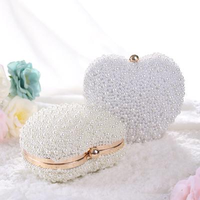 China Fashionable Banquet Custom Clutch Double Sided Pearl Heart Women Bride Wedding Dress Bag Elegant Formal Evening Clutch Bag for sale