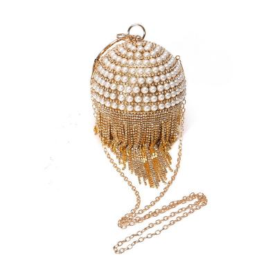 China Fashionable Luxury Rhinestone Ring Handle Evening Bag Tassel Ball Shape Clutch Purse Party Handbag for sale