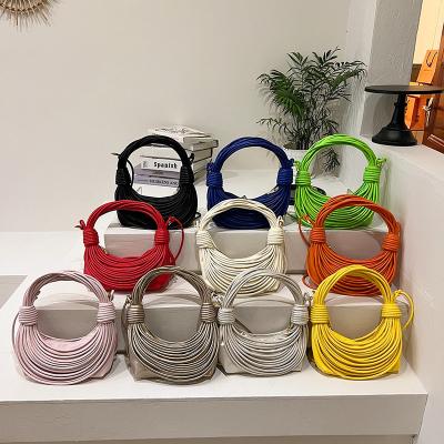 China High quality fashion creative personality multicolor women's bag popular handbag rope knot woven diagonal bag 2023 new for sale