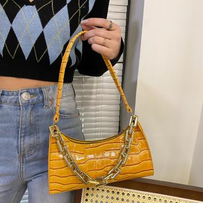 China Others 2023 fashions pure color chains cross - body bags below PU ladies zipper ladies small alligator handbags for sale