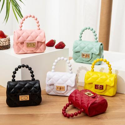 China Others Wholesale Ladies Mini Cute Girls Pinch PVC Pearl Handle Small Jelly Handbags for sale