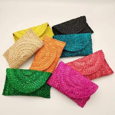 China 2023 Straw Clutch Woven Rattan Handmade Bag Other Fashion Women Purses Straw Woven Ladies Beach Summer New for sale