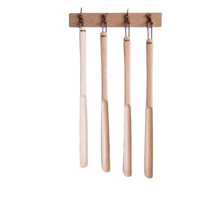 China Good Quality Custom Wooden Handled Shoe Horn Hotel Shoe Long Horns for sale