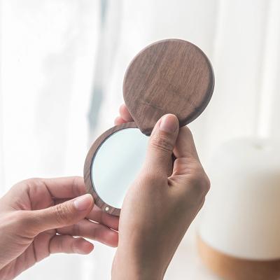 China Face Customized LOGO Round Wood Personalized Makeup Round Pocket Handheld Hand Mirror for sale