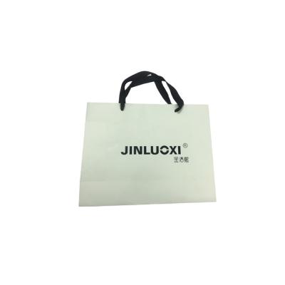 China Wholesales Recyclable Take Out Cheap Reusable Foldable Brown Packaging Shopping Bags Clothing Customized Paper Bags With Your Own Logo for sale