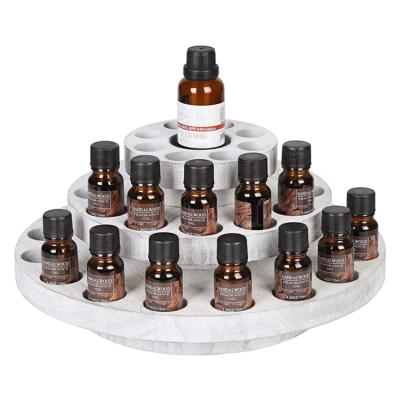 China Europe village wooden oil storage rack 3 layers rotating wooden essential oil nail polish display rack for sale