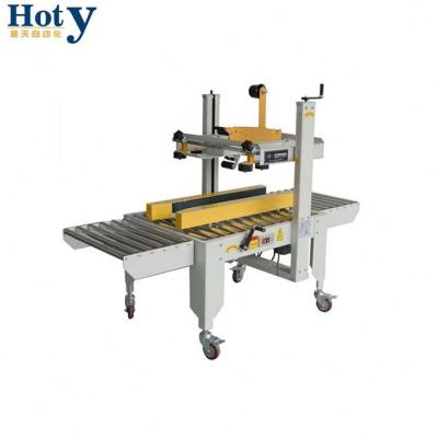 China machinery & Cheap Equipment Price Unmanual Case Egg Tray Carton Sealer Sealing Machine for sale