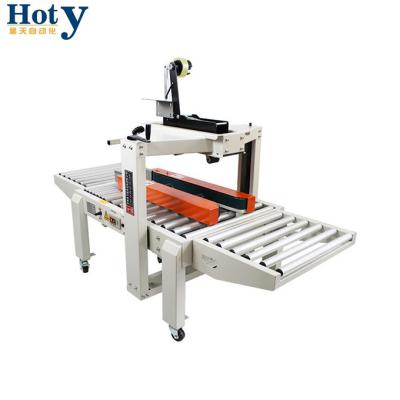 China Semi-auto CLOTHING Application Tape Wide Side Belt Drive Carton Sealer for sale