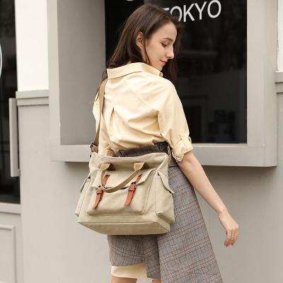 China Wholesale Large Capacity Customized Thick Canvas Shoulder Bag Working Women Tote Canvas Women Travel Durable Cubes Tote Handbags for sale